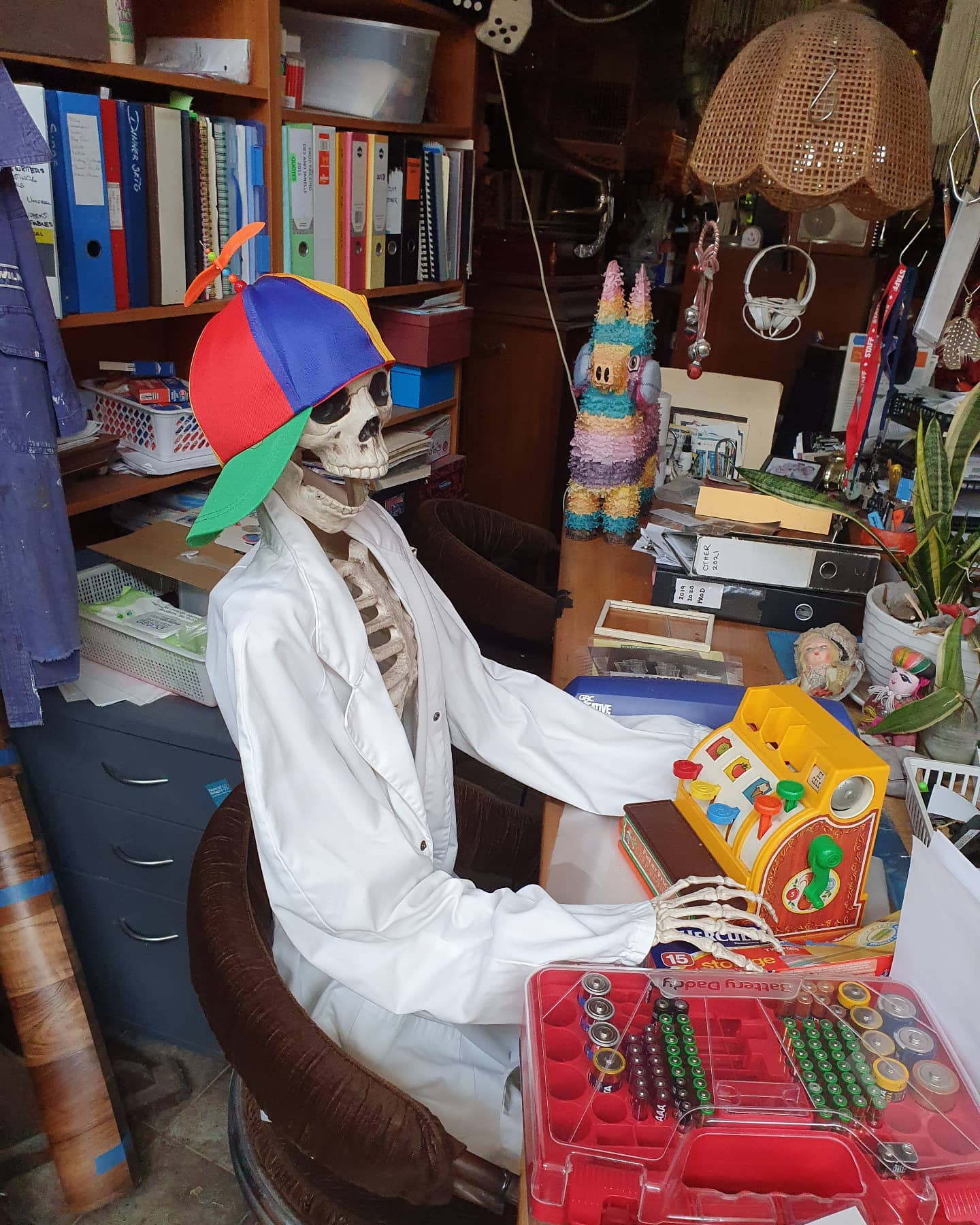 Skeleton with toy register
